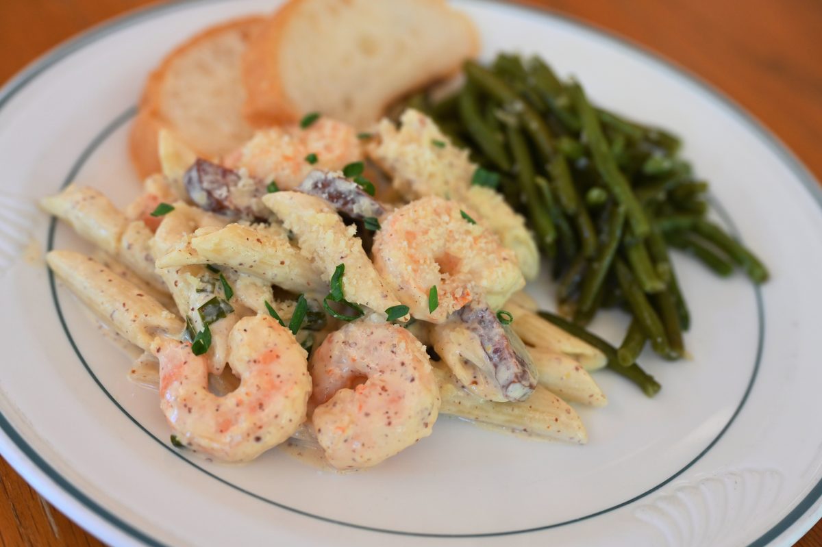 Shrimp and andouille alfredo with Creole mustard sauce — a typical plated meal at the Solomon Center
